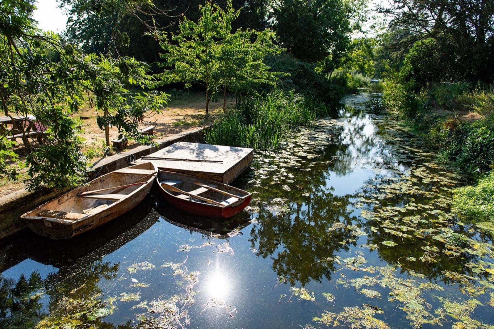 Rowing boats on the river behind Wainford Mill House